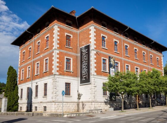A striking orange building that is home to the karst. At the Notranjska Museum Postojna, discover karst through interactive exhibitions, games, and experiences – from dinosaurs and cave dwellers to modern speleology.